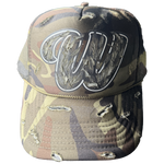 We Hate Haters Club (Distressed Camo) Winners Trucker Hat