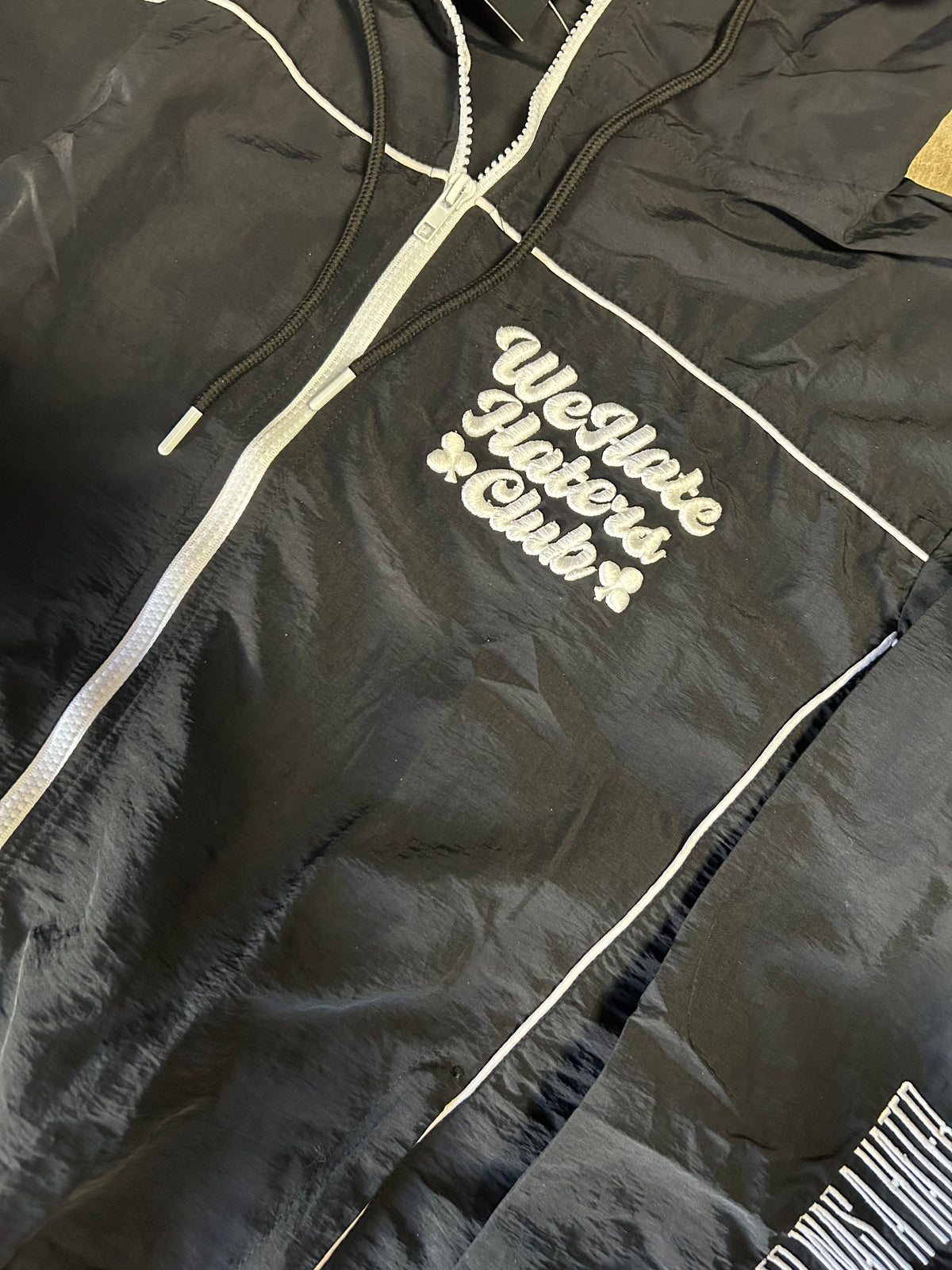 #We Hate Haters Club (Black/White) Windbreaker